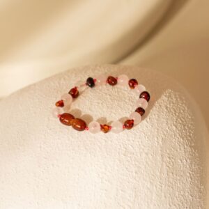 Barnsteen armband roze baby